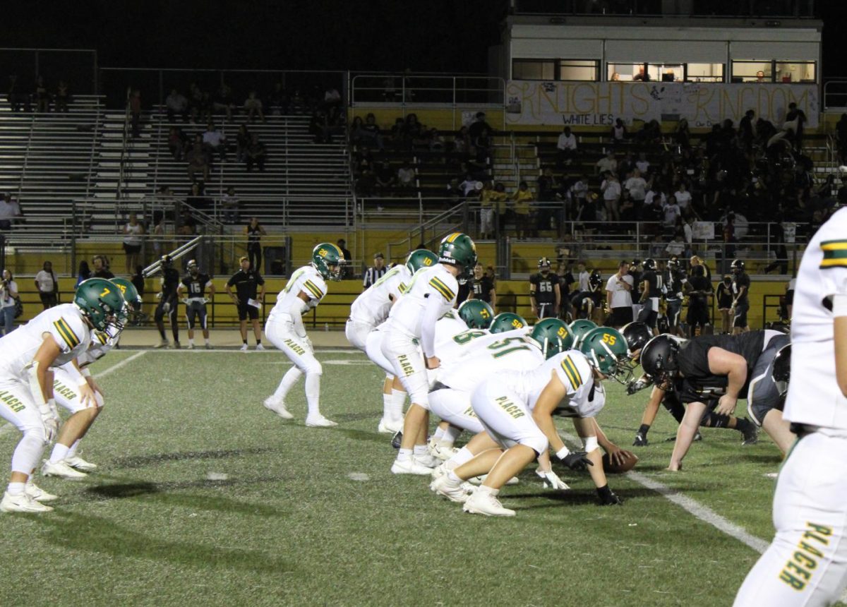 The varsity football team lines up against Rio Linda.  (Courtesy 2024-25 Placer yearbook staff)